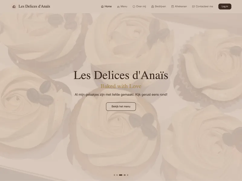 Homepage van Les Delices d'Anaïs met cupcake-fotografie en de tekst 'Baked with Love'